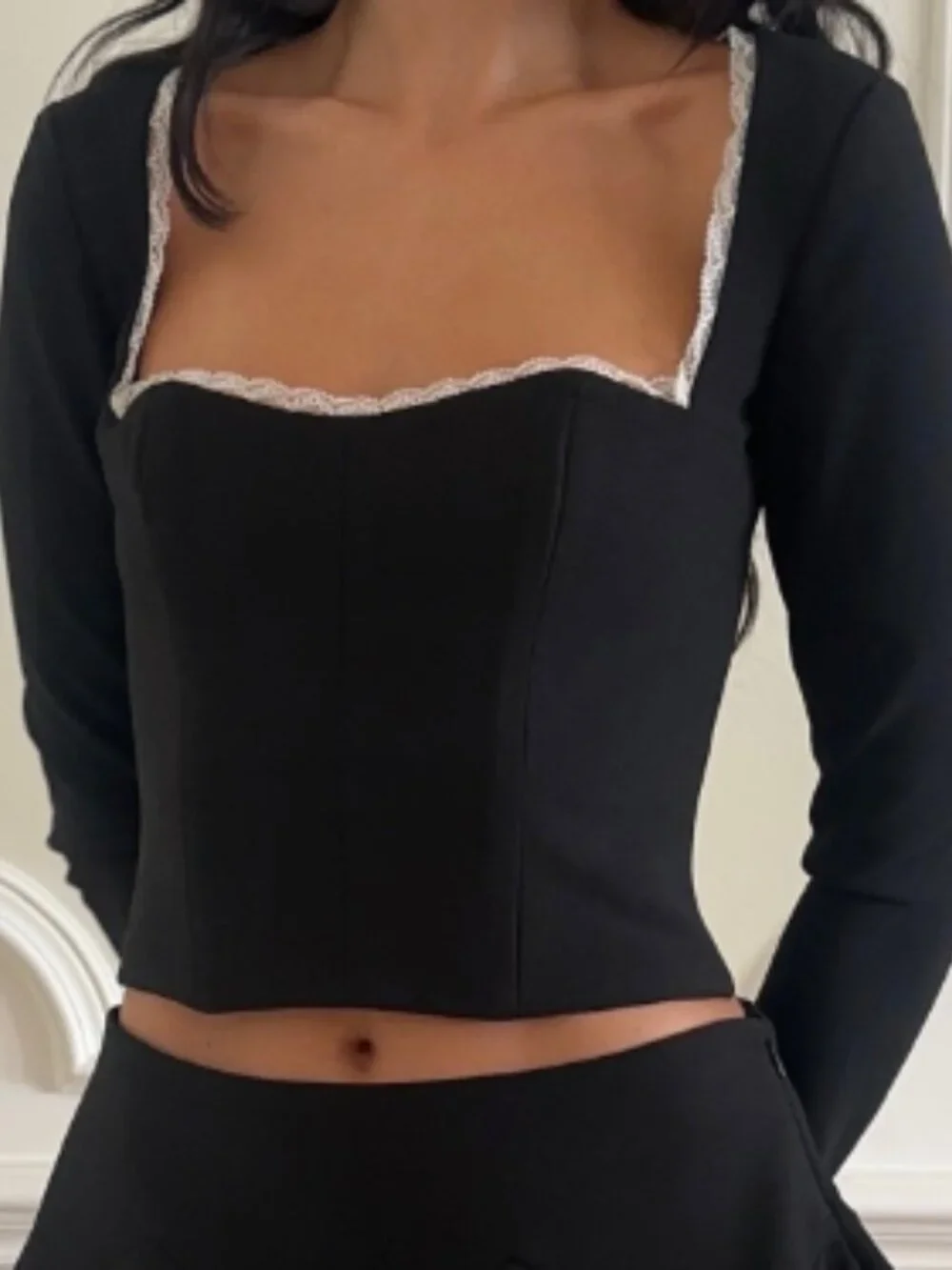 REVOLVE Black Cropped Long-Sleeve Top with White Lace Trim